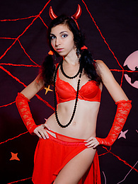 KiloTeens presents: Only one look in the eyes of this fantastic slim teen will tell that she is a little devil inside. No further costume is needed.
