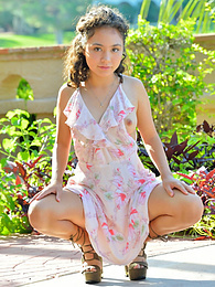 KiloTeens presents: Stunning brunette young Isabel shows tiny tits and spreads her legs outdoor