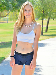 KiloTeens presents: Sporty blonde babe Dakota strips her clothes and flaunts her hot body outdoors