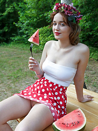 KiloTeens presents: Nice belarusian stunner Rokki removes all clothes on a blanket in a backyard