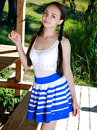 KiloTeens presents: Fresh-Faced russian beauty Mia Grandy gets totally naked on a picnic table in a garden